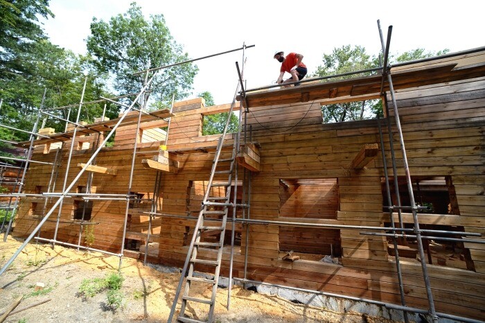 Минстрой: строительство в РФ многоэтажных деревянных домов будет разрешено в 2024г